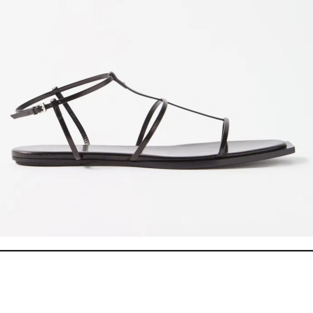 The Row Black Strappy Leather Flat Sandals